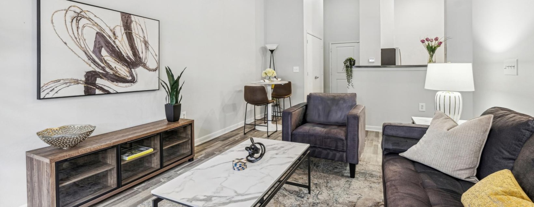 a living room with a couch and a coffeetable