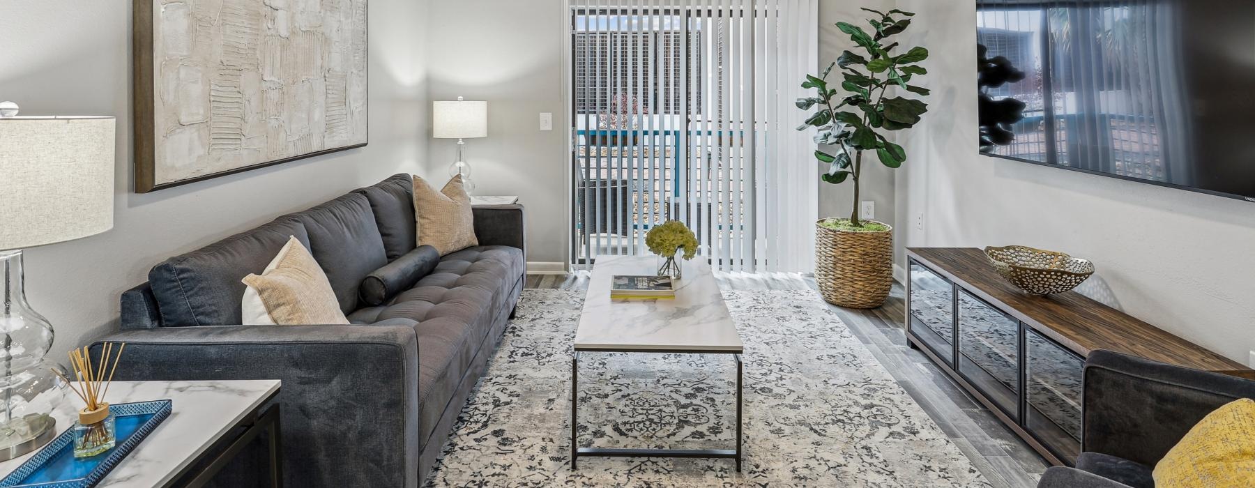 a living room with a couch and a table