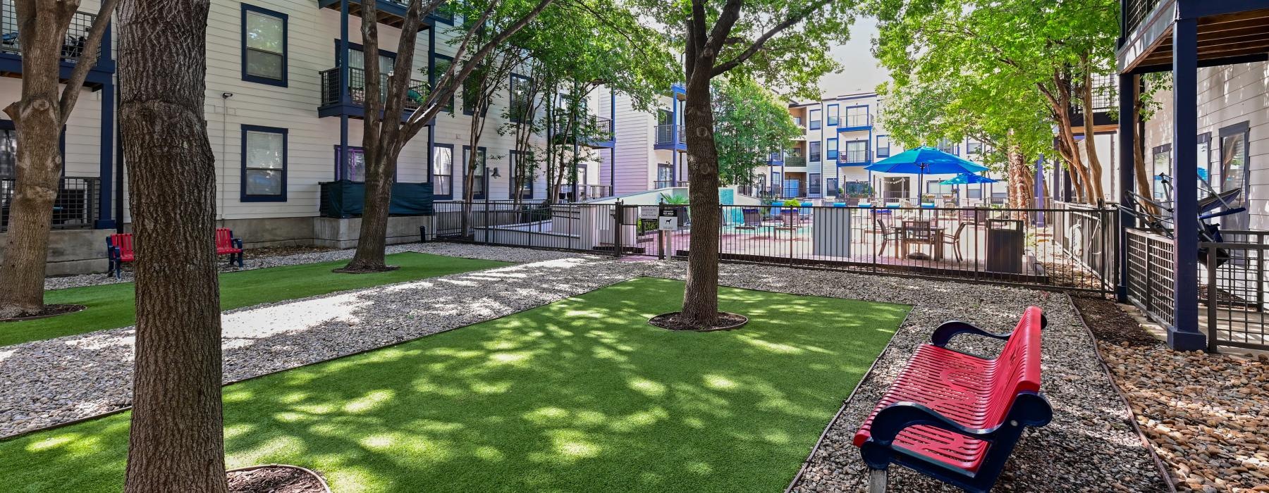 a park bench in a building courtyard