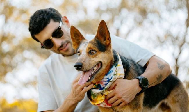 a person holding a dog