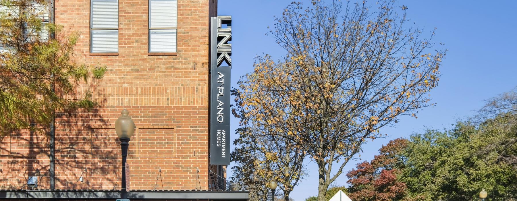 a brick building with a sign on the side that reads link